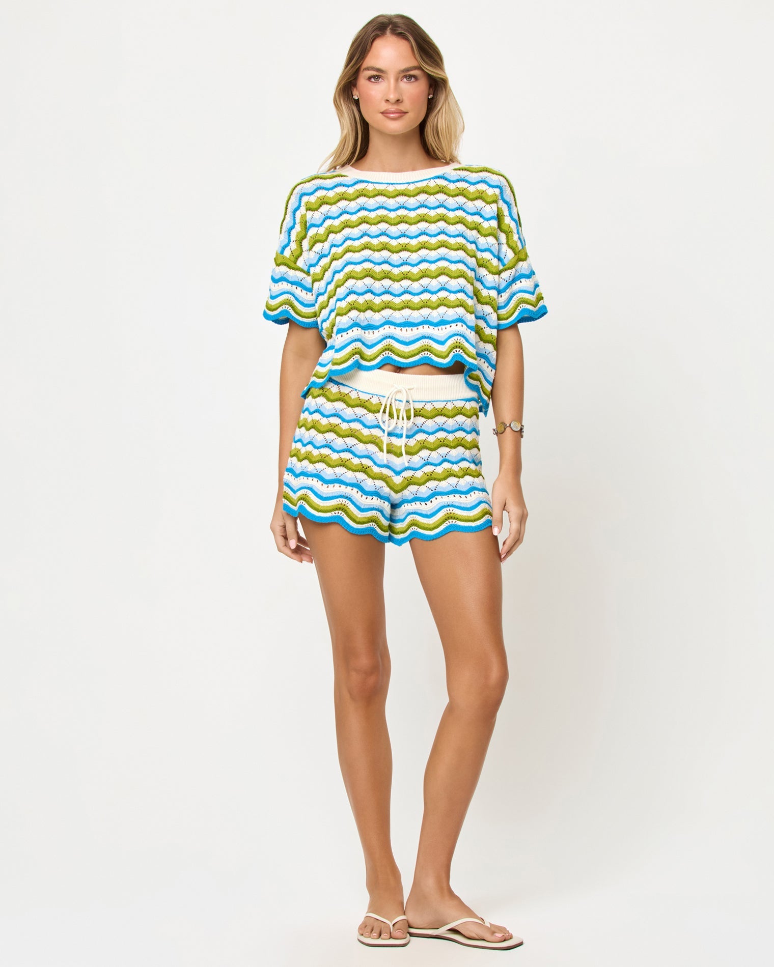 LSPACE Sunchaser top and short in Island Breeze, front view on model.