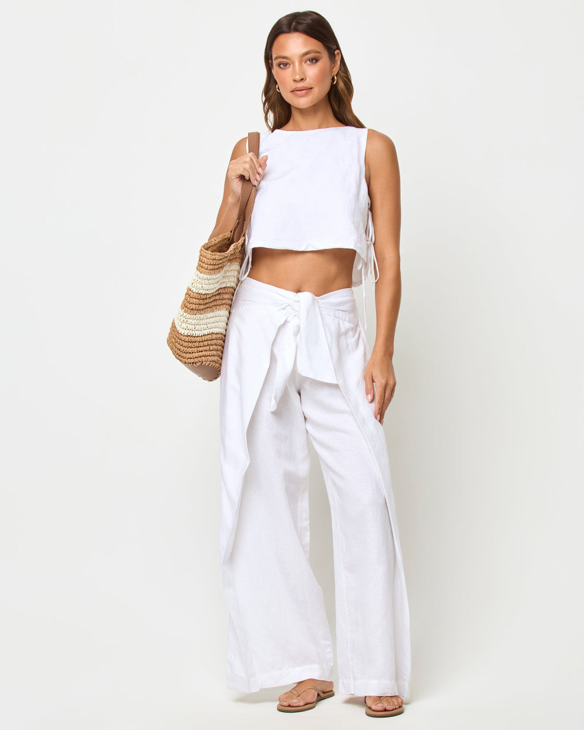 LSPACE Rylee pant in white, front view on model.