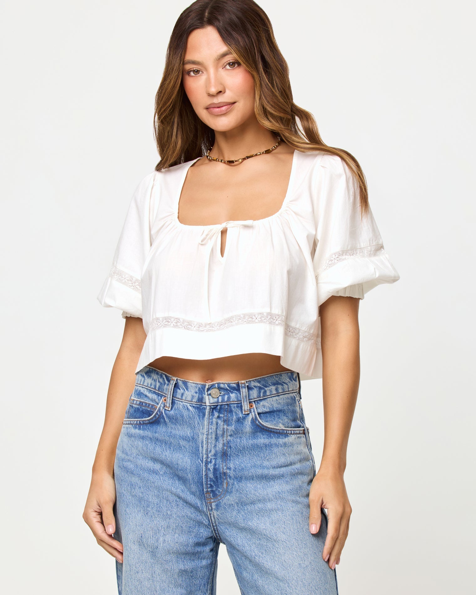 LSPACE Lucie top in Cream, close-up front view on model.