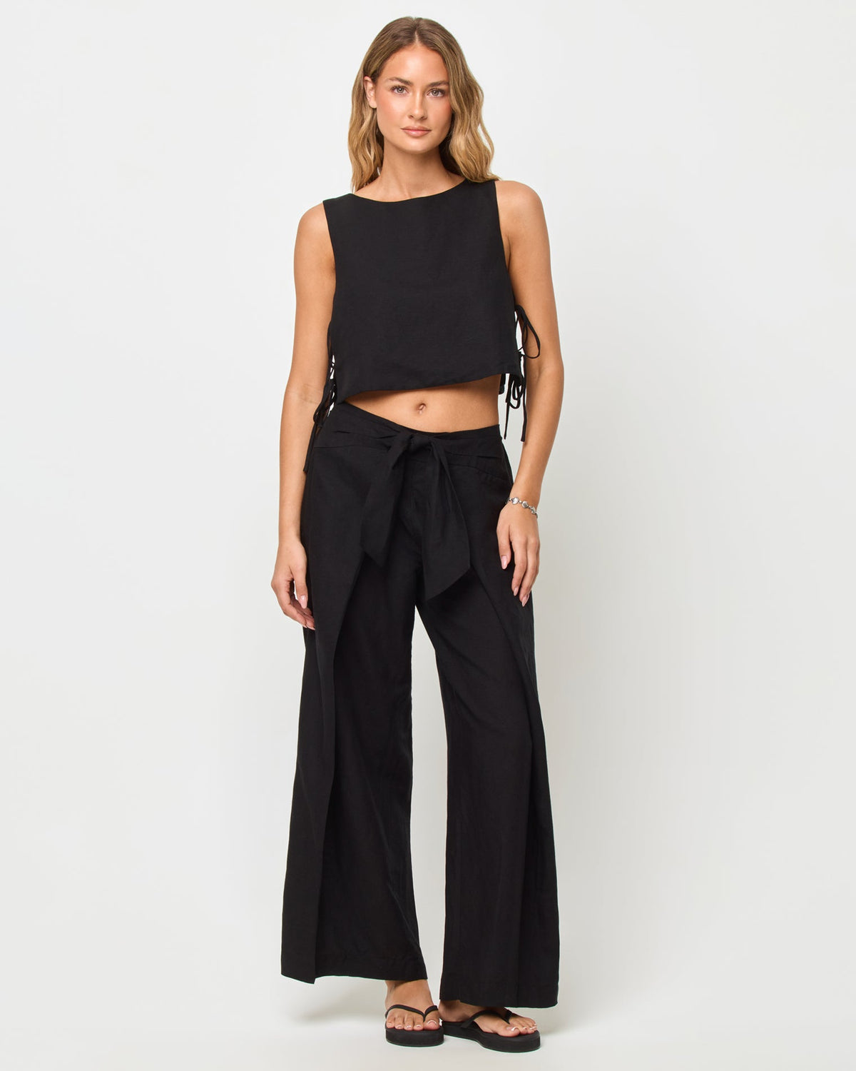 LSPACE Rylee top in black, front view on model.