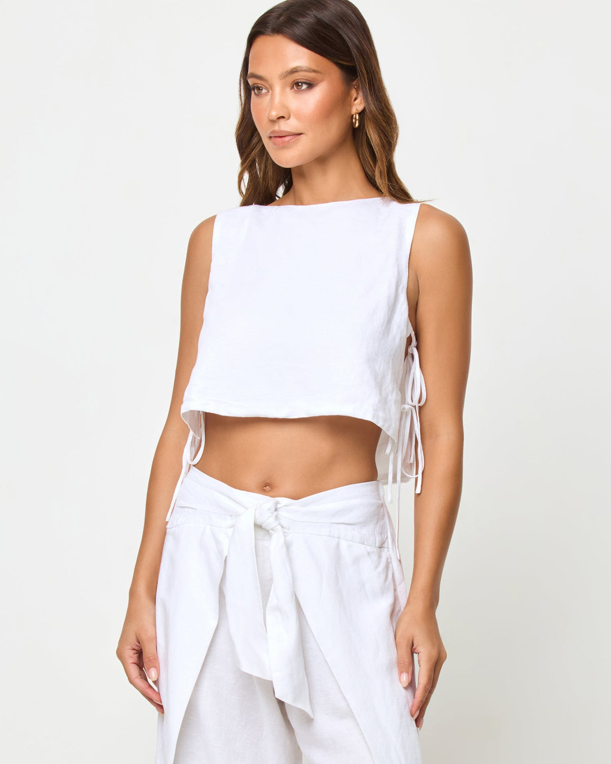 LSPACE Rylee pant in white, close-up detail view on model.