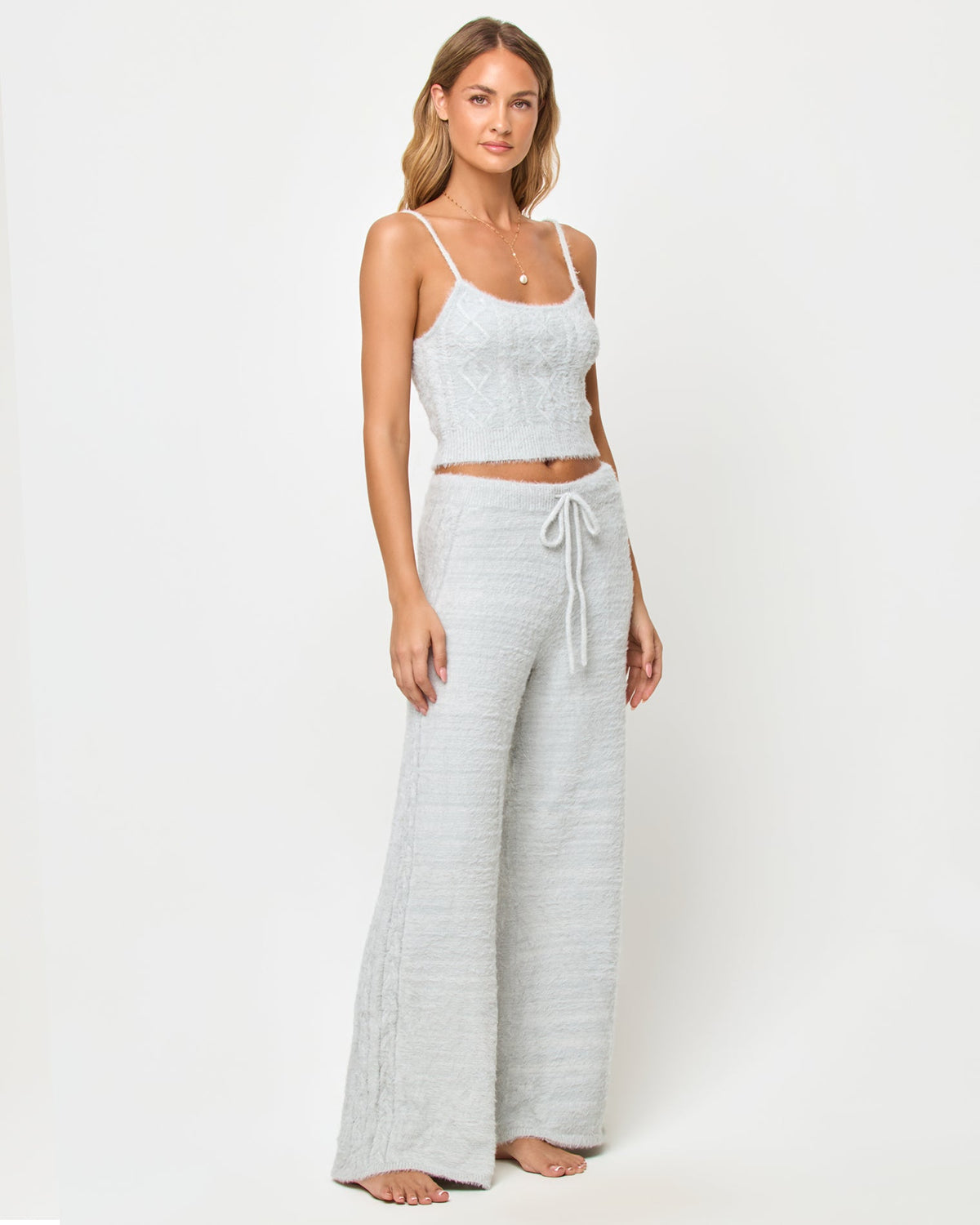 LSPACE Olivia Tank in heather gray with matching pants, three-quarter view on model.