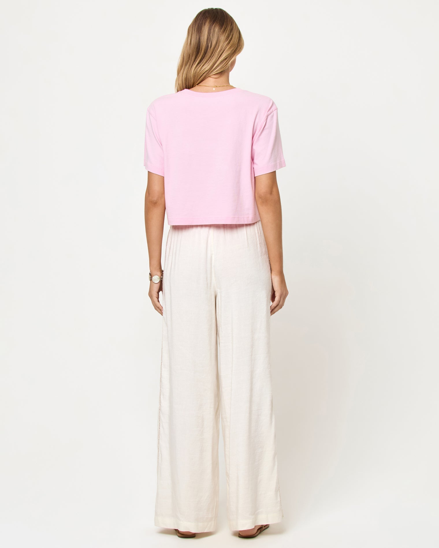 LSPACE Core top in Rosewater, back view on model.