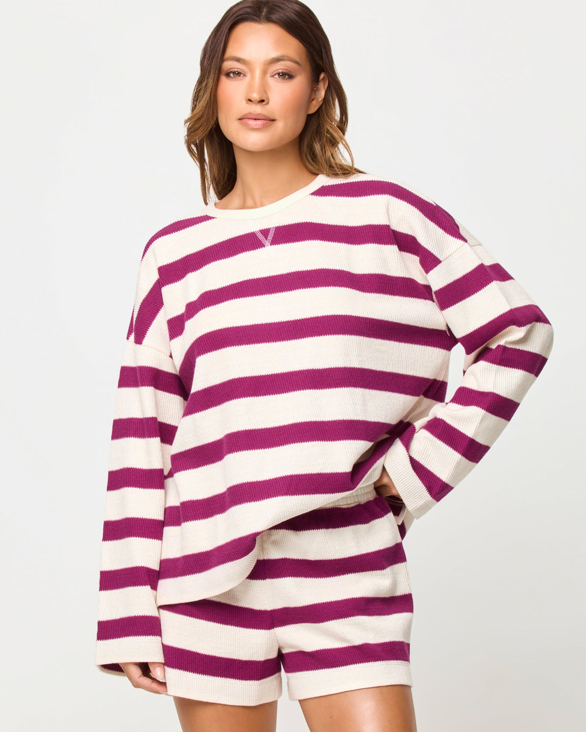 LSPACE Maeve top in Berry Jam Cream print, front view on model.