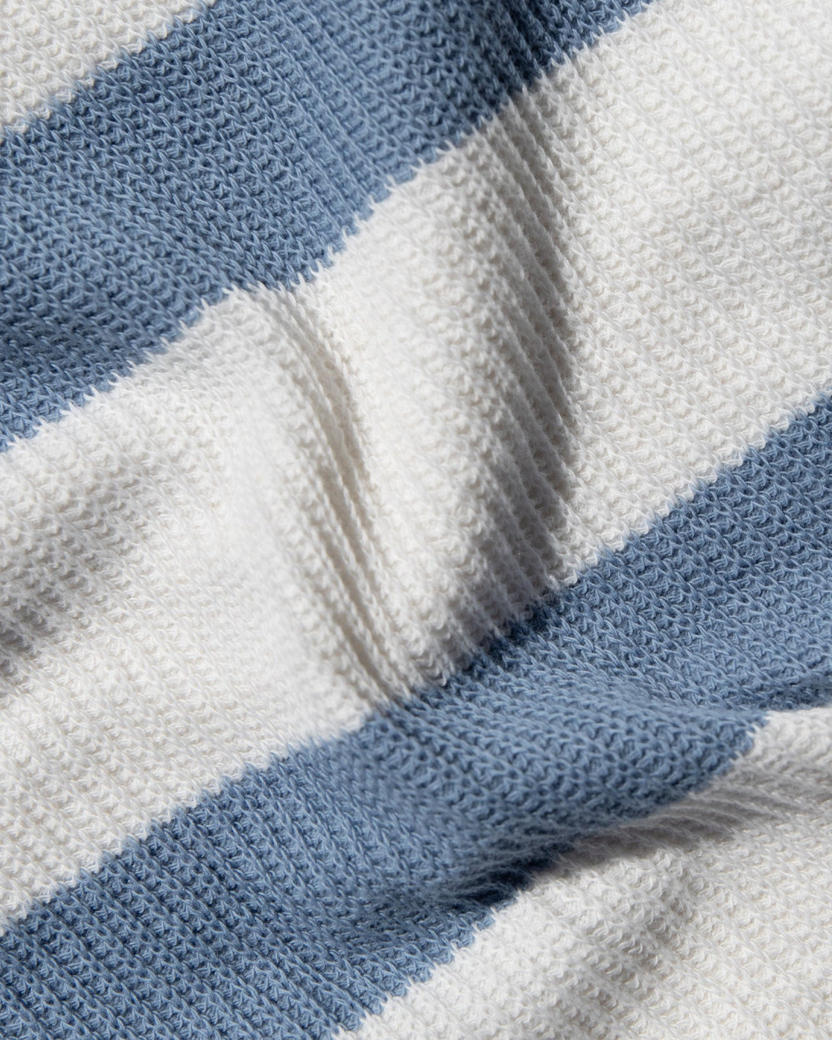 Closeup image of the Maeve Top in Chambray Cream, showing the waffle knit material.