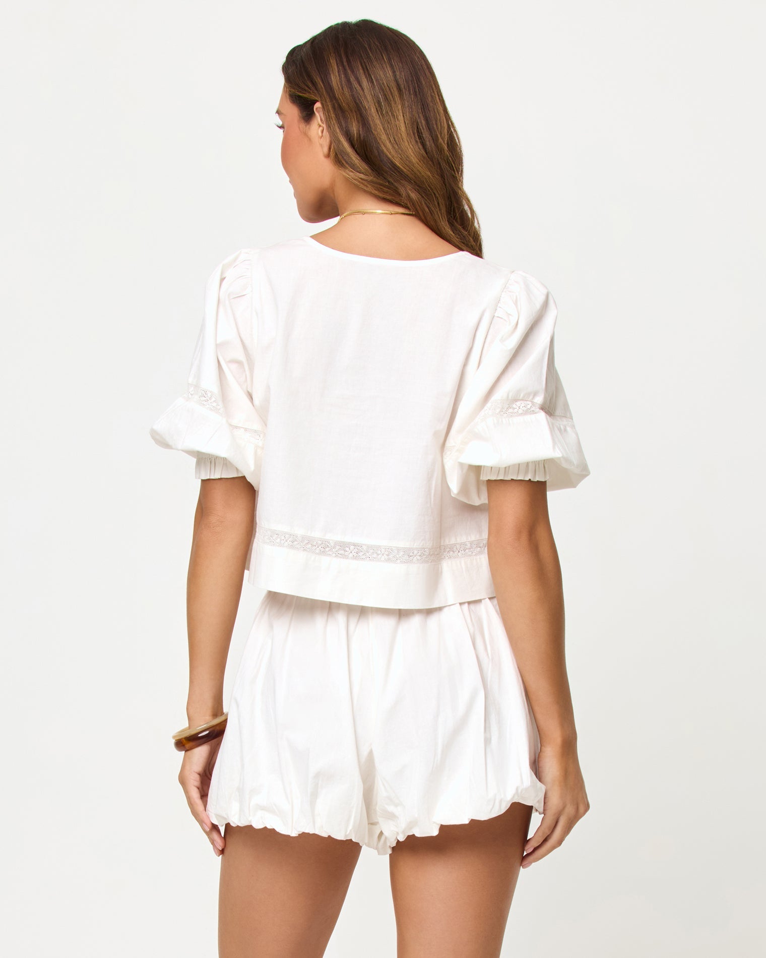 LSPACE Lucie Short in cream, back view on model.