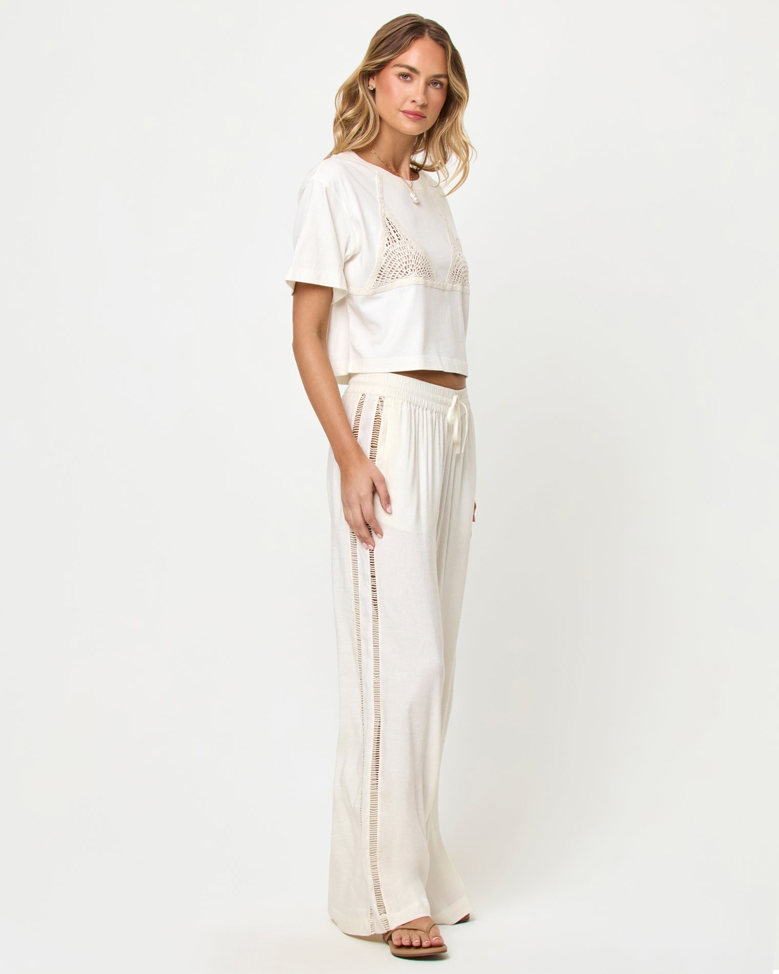LSPACE At Your Leisure pant and Core Top in cream-natural, side view on model.
