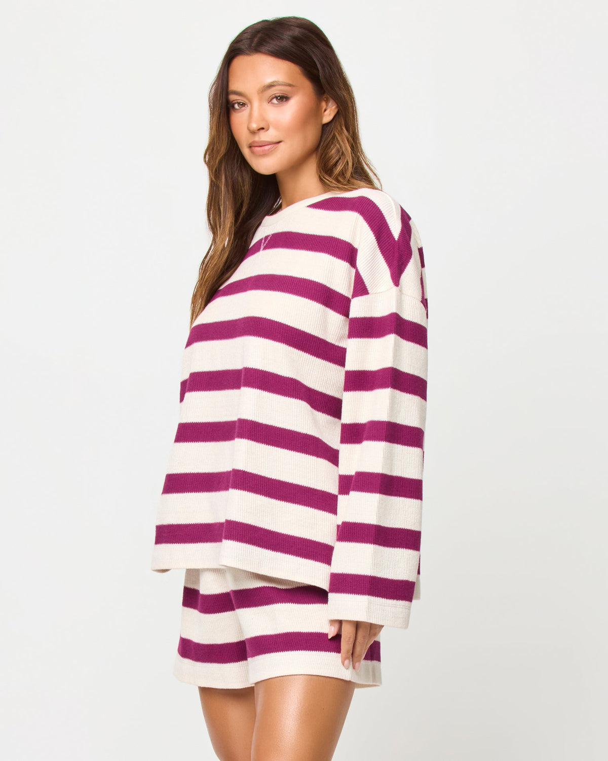 LSPACE Maeve top in Berry Jam Cream print, three-quarter view on model.