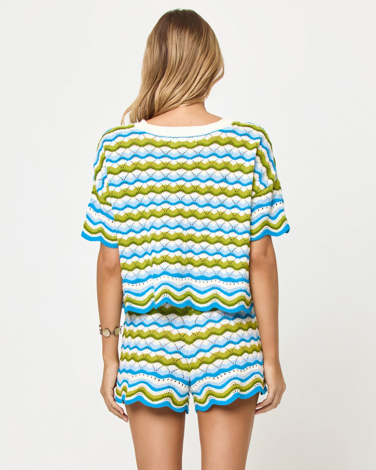 LSPACE Sunchaser top and short in Island Breeze, back view on model.