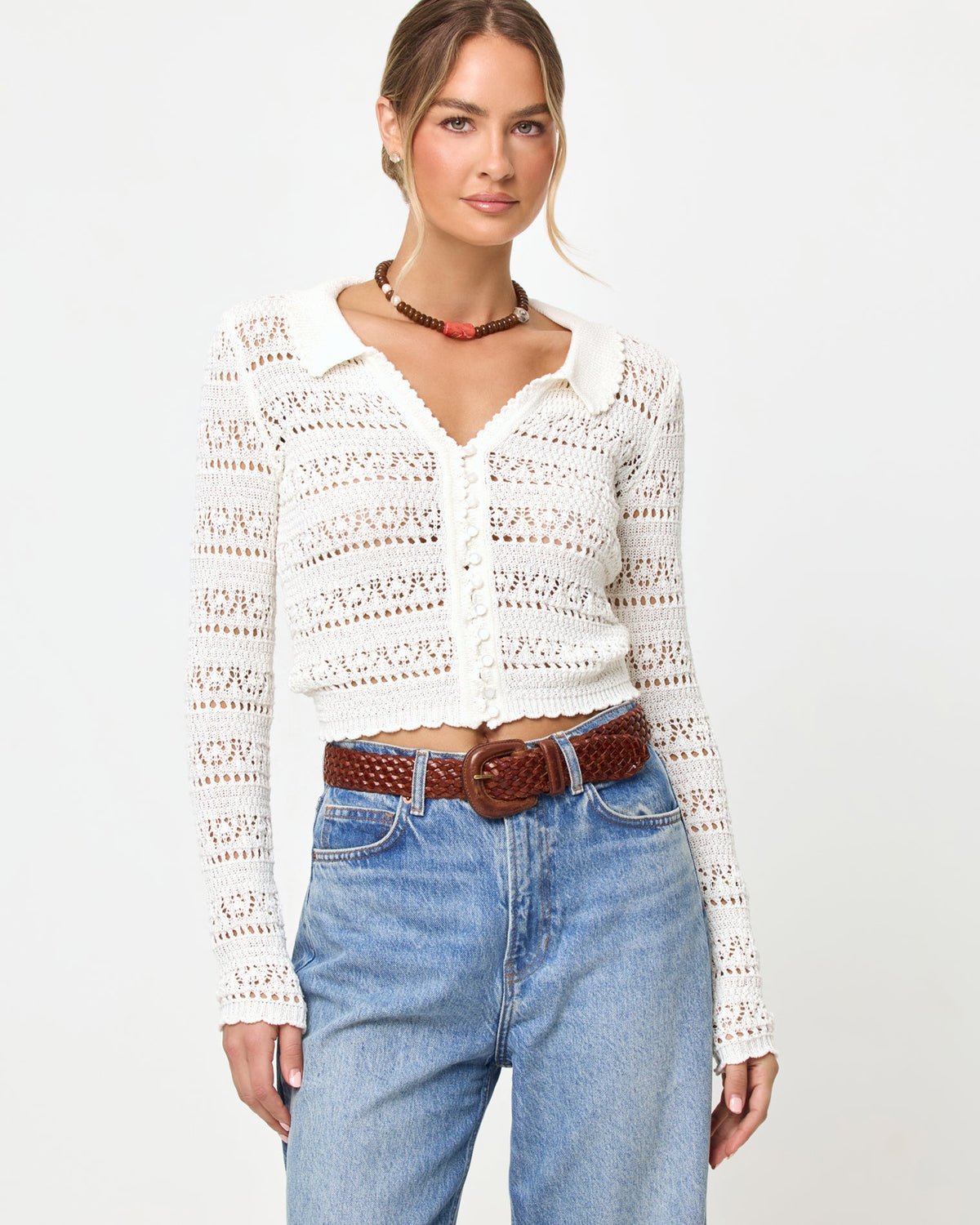 Cream | Badge:New Arrival_#B2AC88_#ffffff'
LSPACE Leighton sweater in Cream, close-up detail view on model.