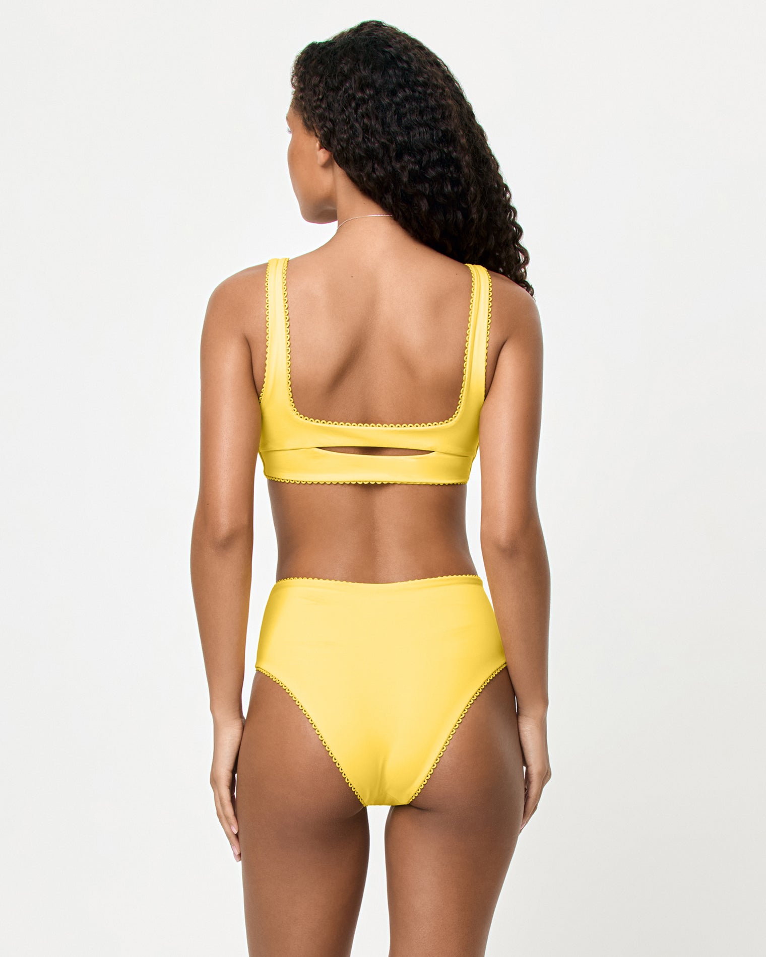 Ditsy | Badge:New Arrival_#B2AC88_#ffffff'
LSPACE Effie bikini top and Soleil bikini bottom in Ditsy, back view on model.