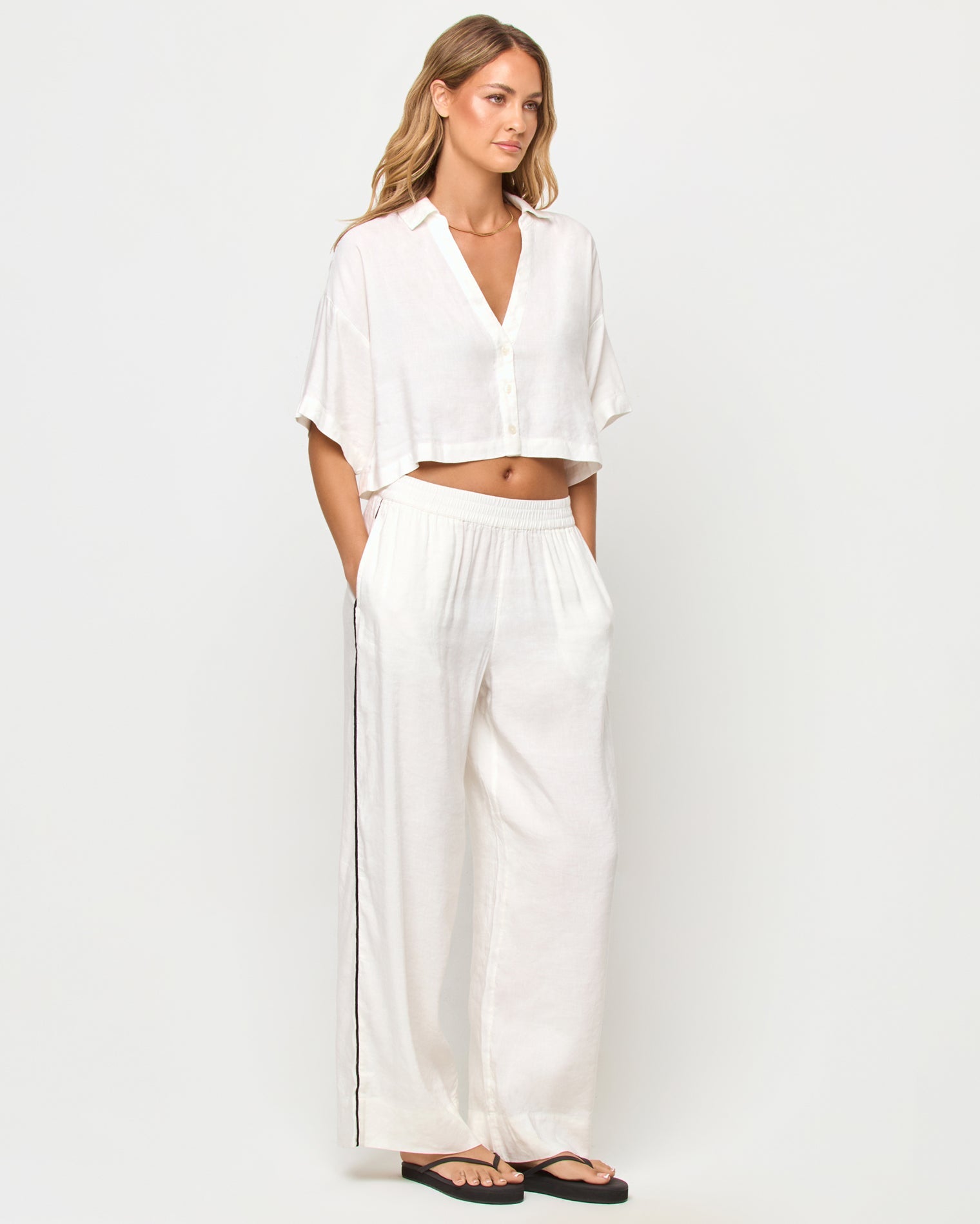 LSPACE Kitt top in Cream, three-quarter view on model.