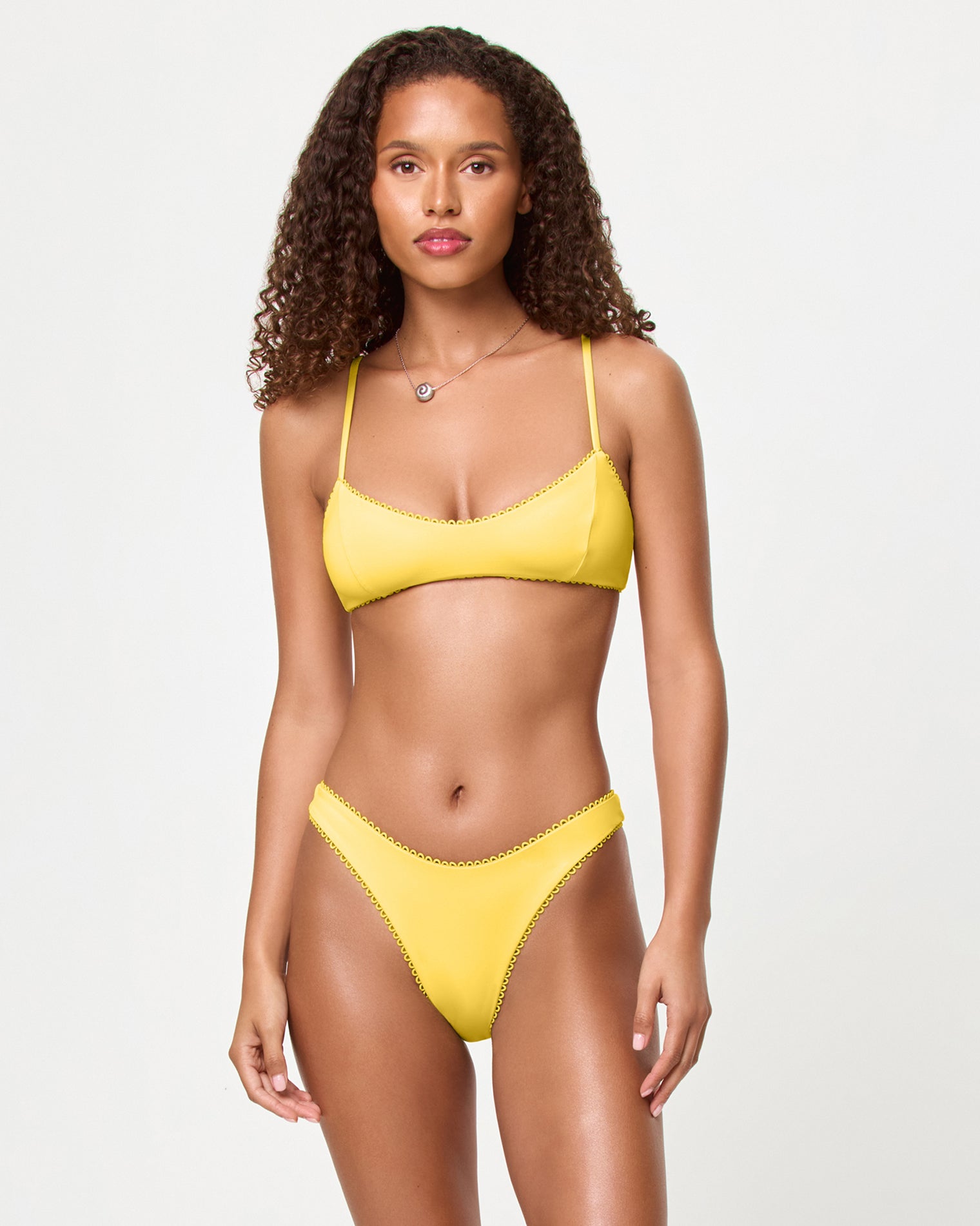LSPACE Damian bikini bottom in Ditsy, front view on model.