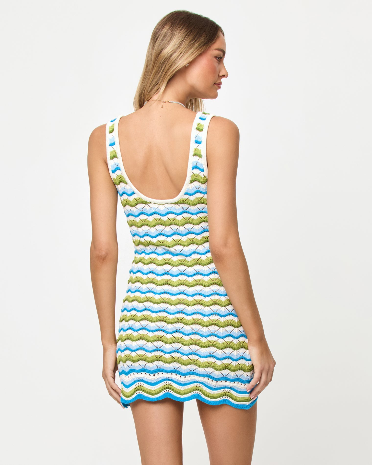 LSPACE Sunchaser Dress in Island Breeze, back view on model.