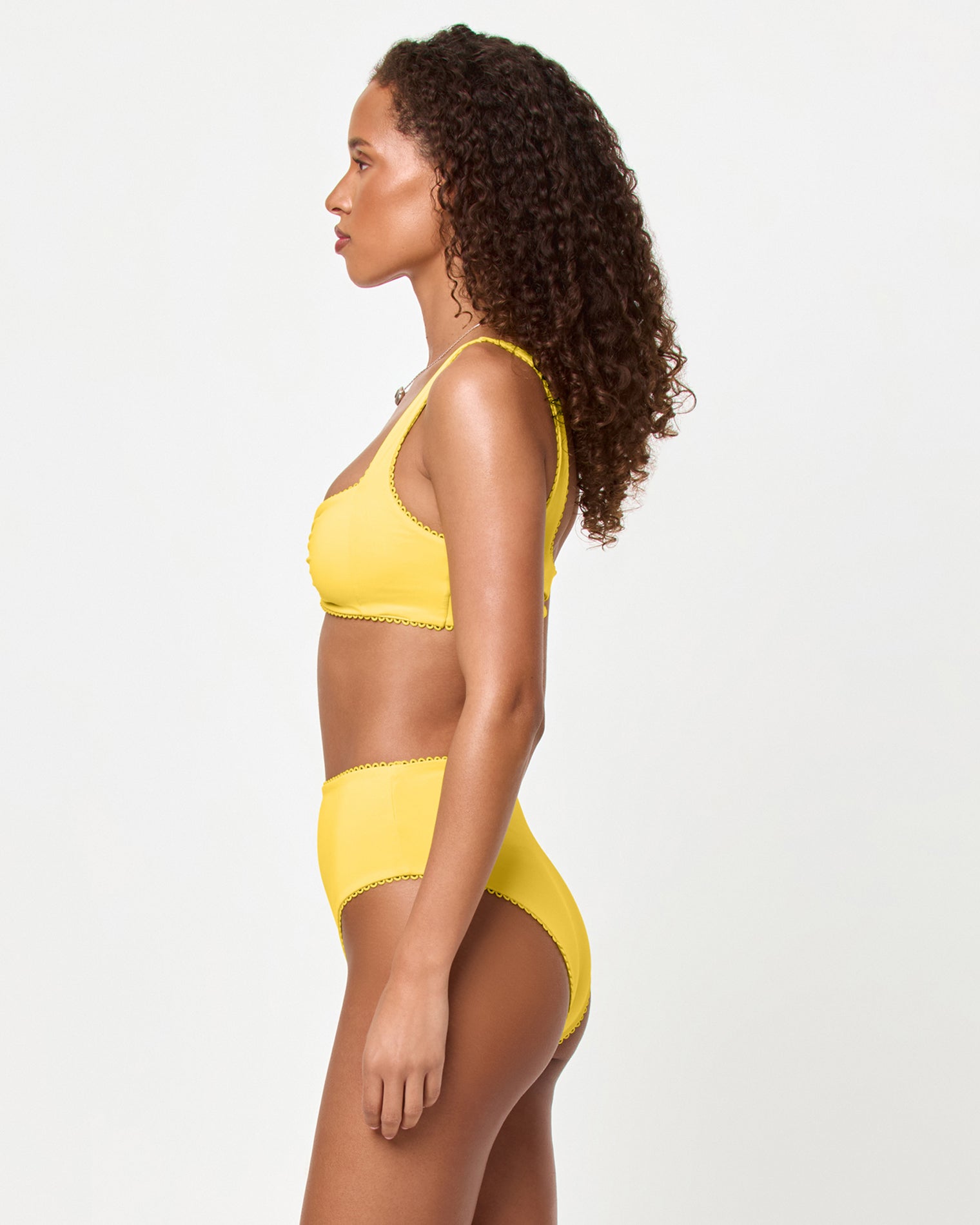 LSPACE Effie bikini top and Soleil bikini bottom in Ditsy, side view on model.